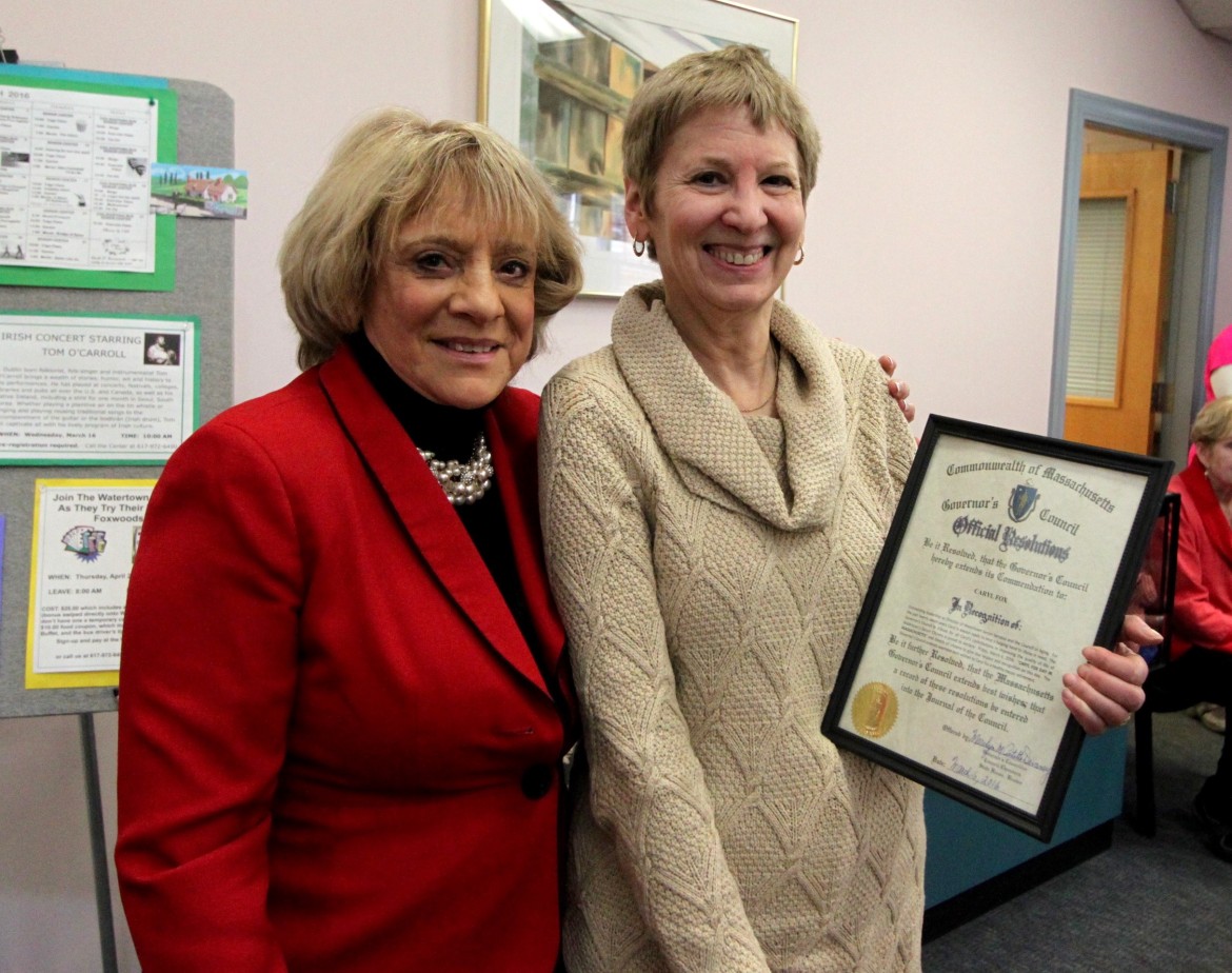 Retiring Senior Center Director Caryl Fox, right, received a proclamation from Governor's Councilor Marilyn Pettito Devaney.