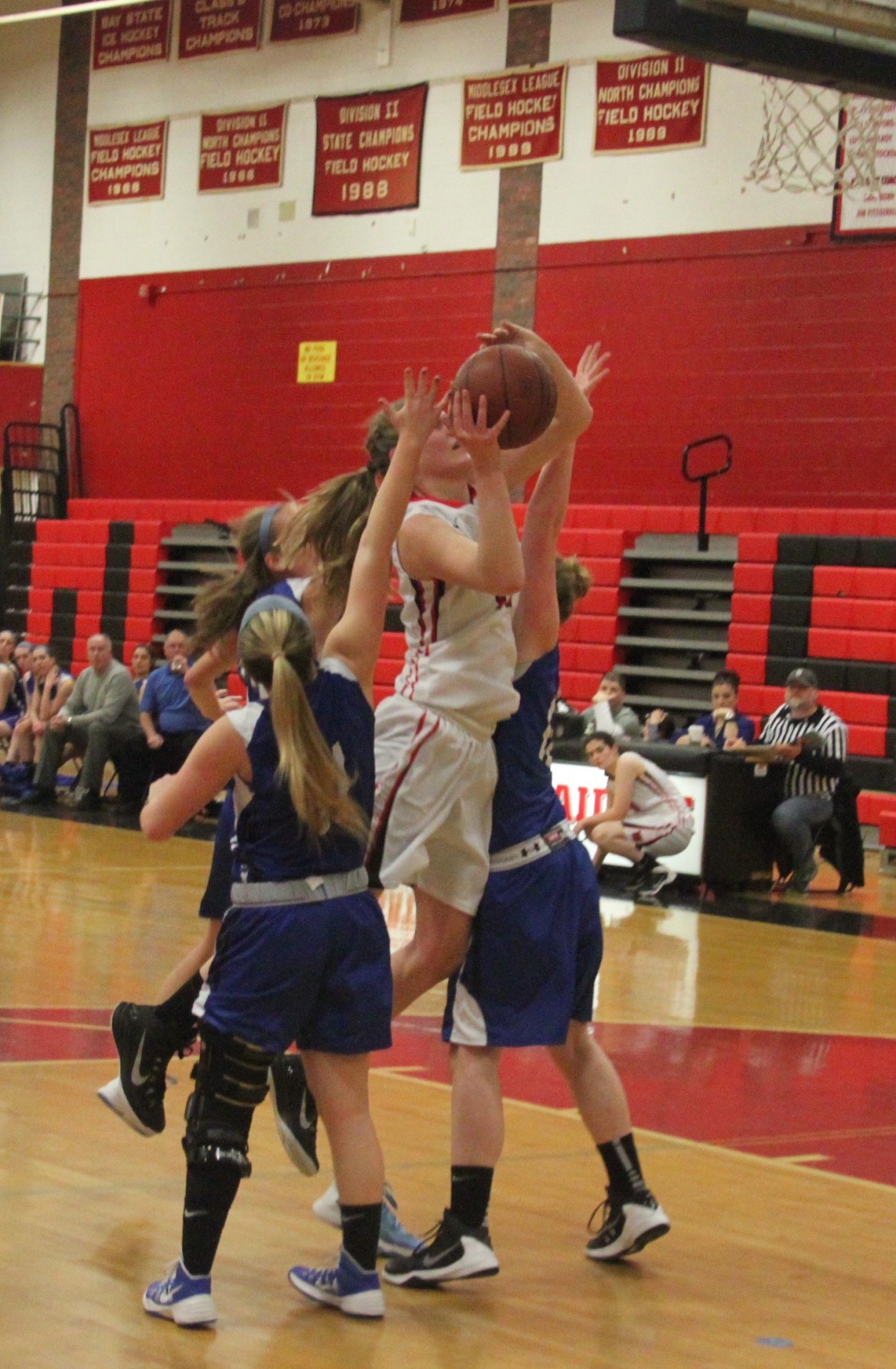 Junior center Shannon Murphy fights against Danver's defenders. She had 9 of Watertown's points in the 52-33 win.
