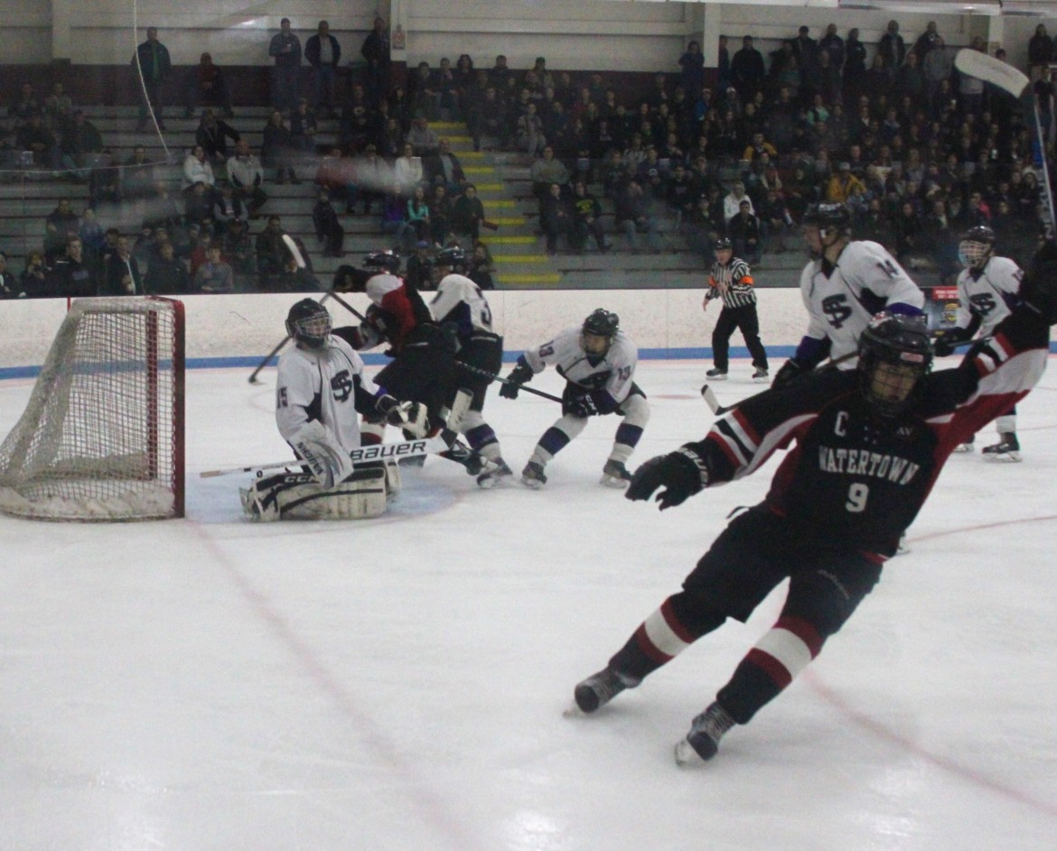 Watertown senior Tyler Gardiner celebrates after scoring in first period of the North Section semifinal against Shawsheen.