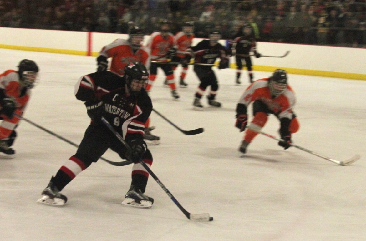 Watertown senior Tyler Gardiner drives to the net against Wayland in the state tournament game Monday night.