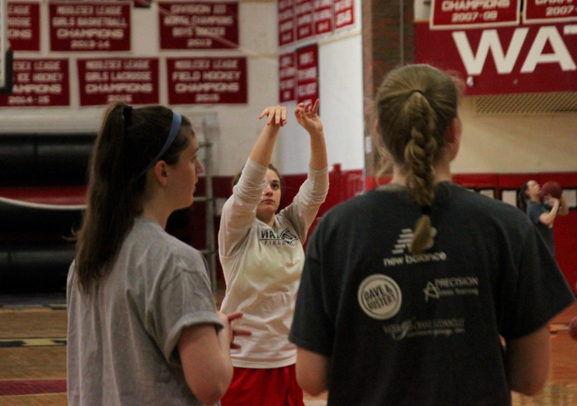 Watertown senior guard Michaela Antonellis shoots a free throw in preparation for her last competitive basketball game – the state final.