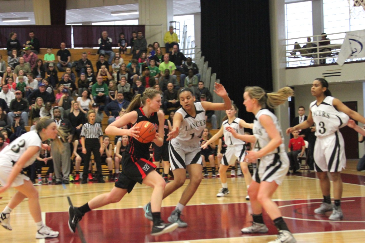 Watertown junior center Shannon Murphy drives the lane against Longmeadow in the State Final at Springfield College.