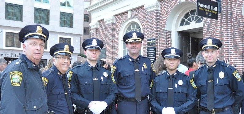 Watertown's newest police officers, King Lam (second from right) and Michael Grzelcyk (third from left) shown here with, from left, Capt. Raymond DuPuis, Capt. Thomas Rocca Chief Michael Lawn,  and Lt. Dan Unsworth.