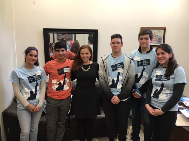 The Watertown Youth Coalition students pose with Emily Izzo, aide for State Rep. John Lawn. 