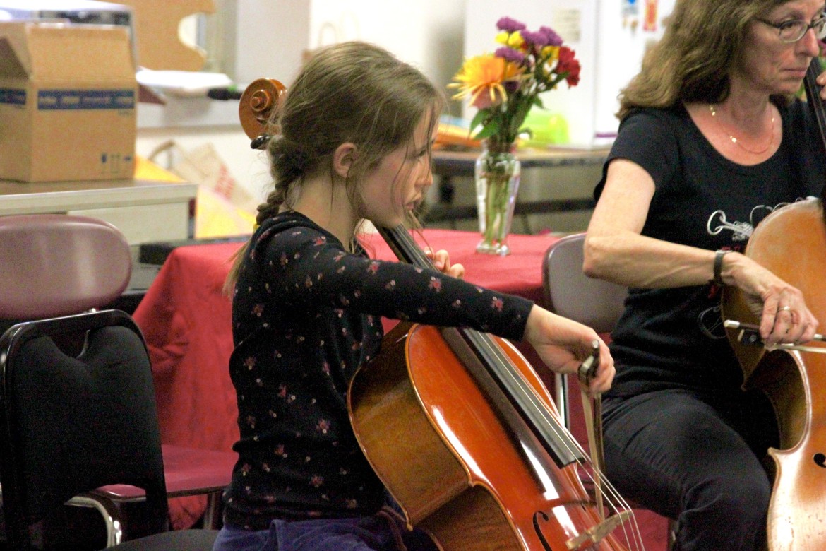 A young cellist plays a duet during the Watertown MusicFest Friday at Watertown Middle School.