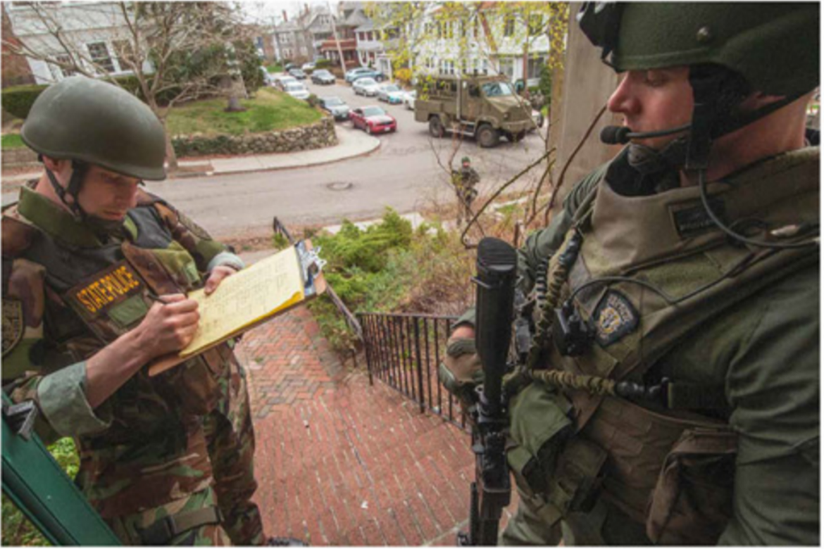 A SWAT team showed up at the door of photographer Joshua Touster who included the photo capturing the aftermath of the Boston Marathon Bombings.