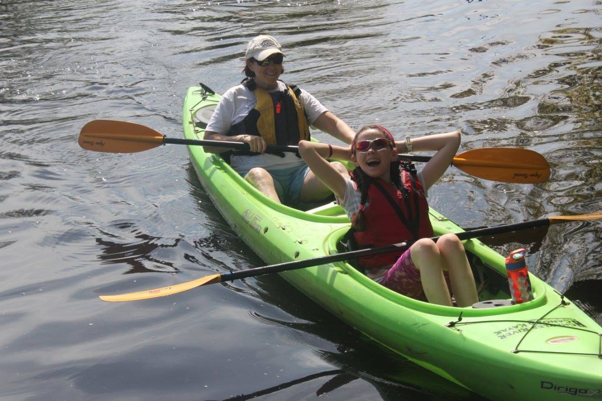 Kayakers relaxed on the Charles River Saturday during the first program offered by the town.