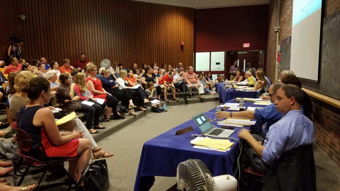 Parents packed the lecture hall at Watertown High School to discuss plans to deal with school overcrowding.