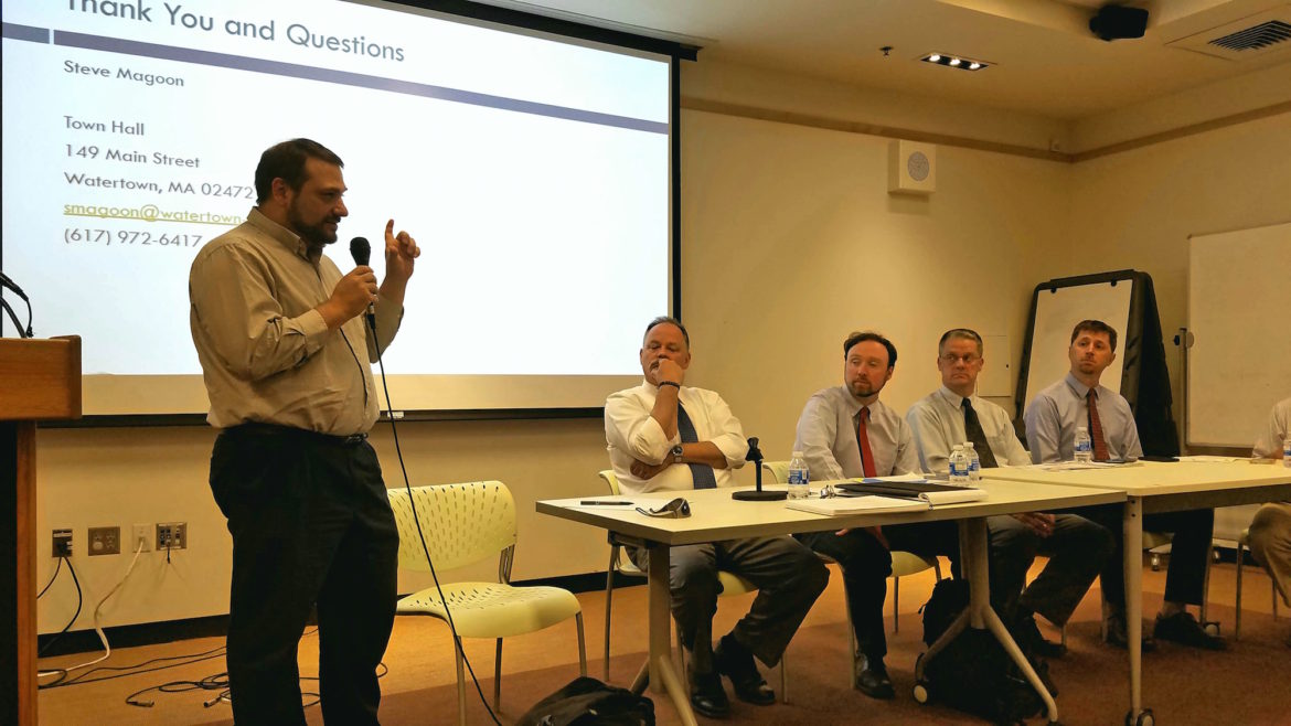 Ralph DiNisco of Nelson Nygaard, speaks during a Transportation issues forum. Looking on are other panelists, Steve Magoon of the Watertown Community Development and Planning Department; James Freas, Newtown's chief planner; Mike Garvin, Waltham's Traffic Engineer and Watertown Town Councilor Aaron Dushku.