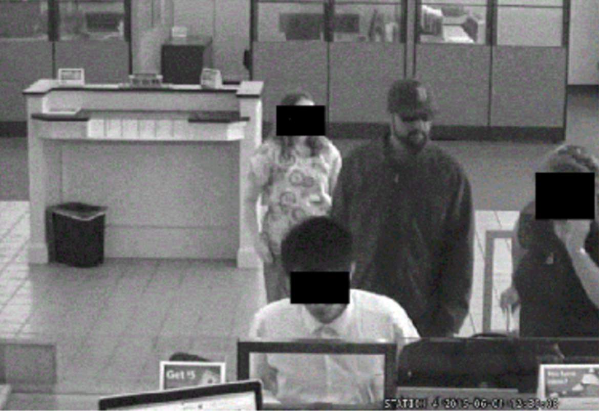 A still from a security video of the man wanted for robbing Santander Bank in Watertown.