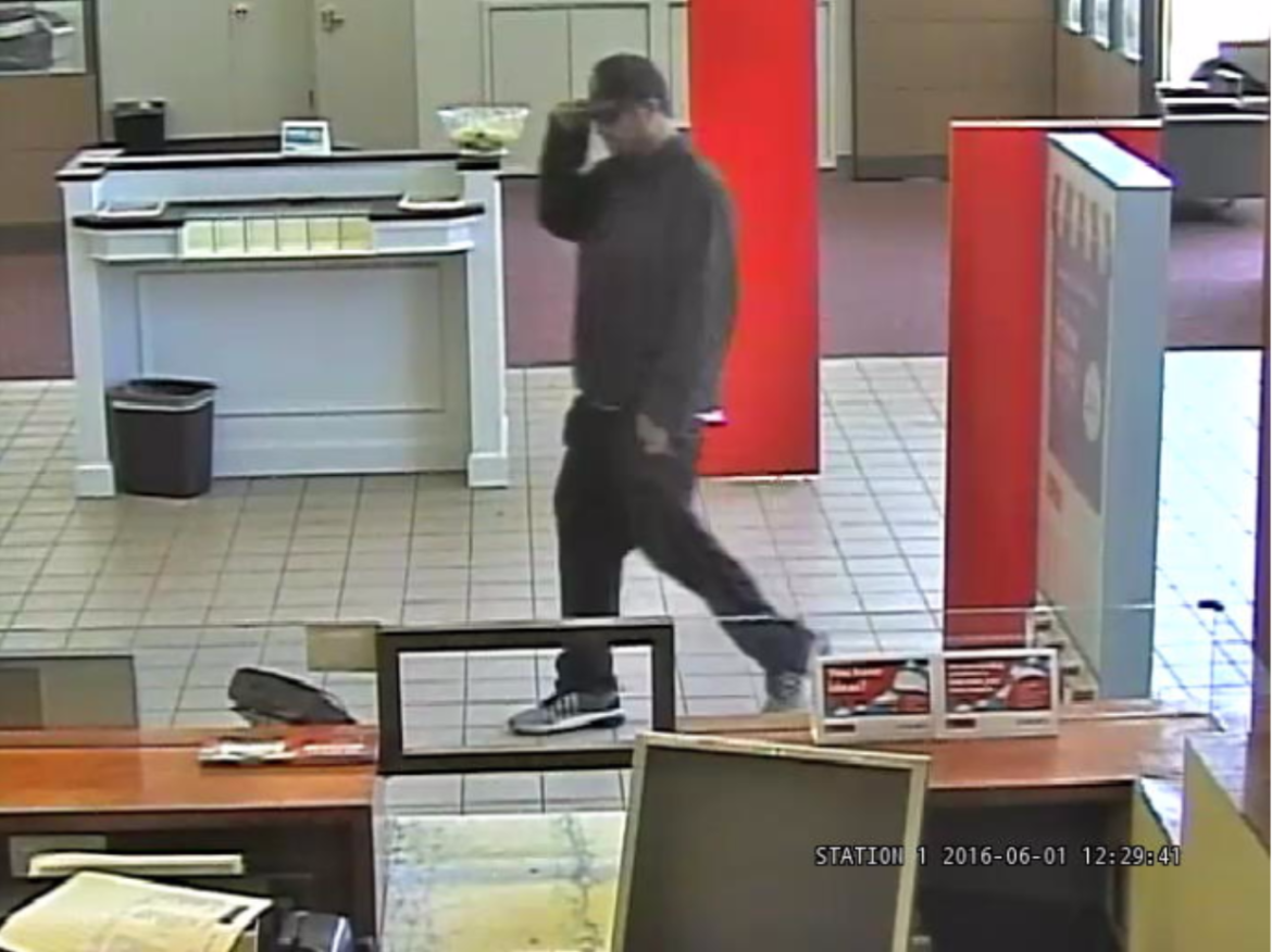 This man, described as 6-feet tall, with dark facial hair, is the suspect in a bank robbery in Watertown on Wednesday.