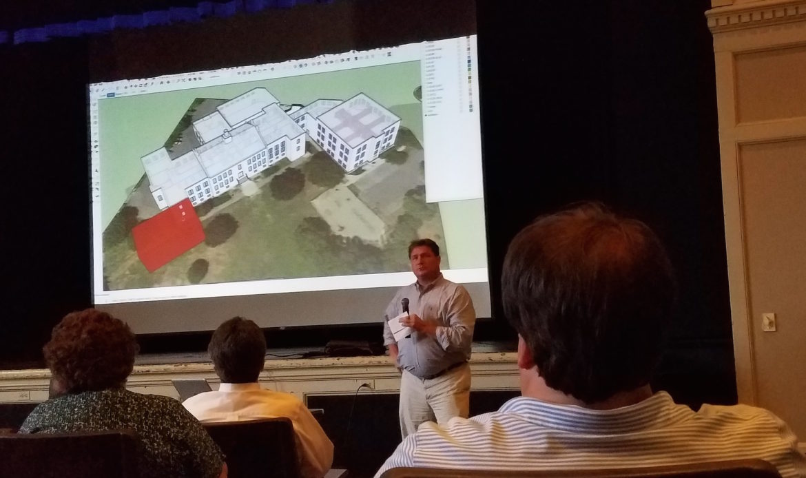 SMMA's Michael van Hamel discusses a slide showing a section of Watertown High School that could be reconfigured to be used better during the School Master Plan Community Forum.