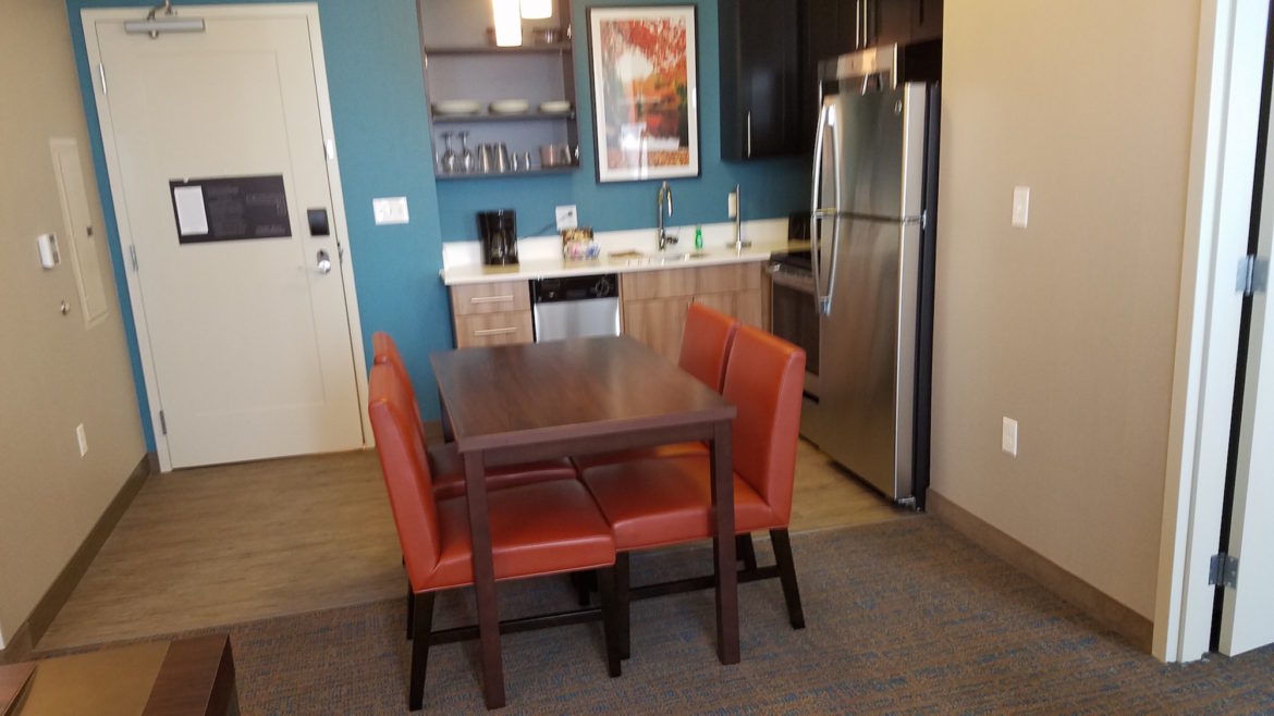 The dining area and kitchen in one of the rooms at the Residence Inn by Marriott.