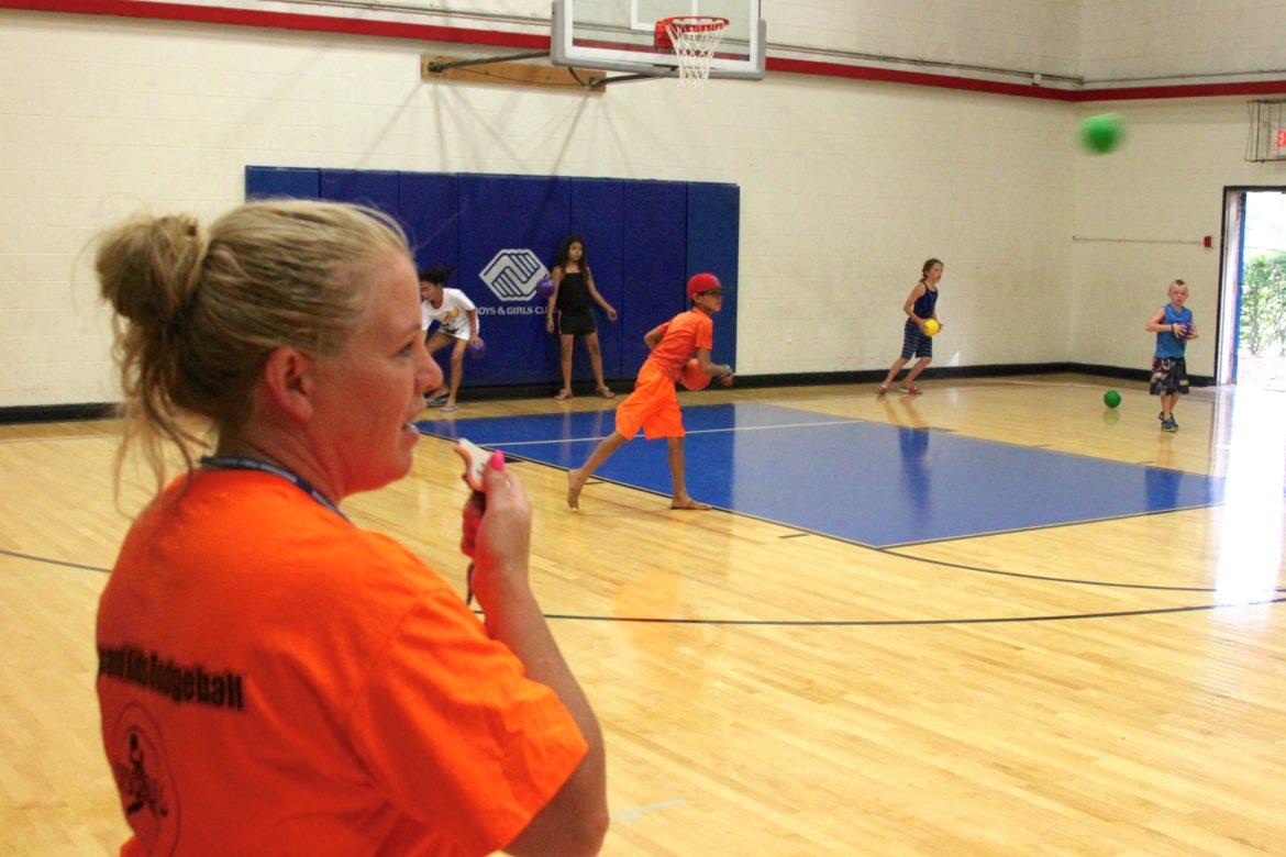 Watertown Police Officer Kerry Kelley watched over the Cops and Kids Dodgeball game Thursday night. She likes to be known by the children in town so they have someone to go to if they need help.