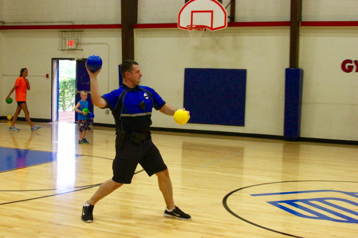 Officer Kevin McManus joined in the action of the Cops & Kids Dodgeball game at the Watertown Boys & Girls Club.