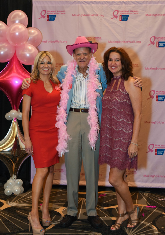 Watertown's Ed Scheinbart has some fun with 7 News’ Christ Delcamp, left, and Magic 106.7’s Sue Tabb at the Making Strides Against Breast Cancer of Boston kickoff.