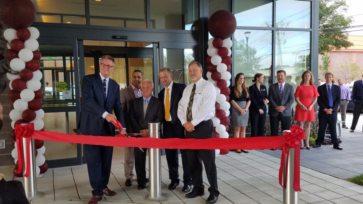 The ribbon cutting to open the new Residence Inn by Marriott on Tuesday. From left, Bill McQuillan of Boylston Properties; Sharad Chand, general manger of the hotel; Town Council President Mark Sideris; Mark Deschenes of Boylston Properties and Assistant Town Manager Steve Magoon.