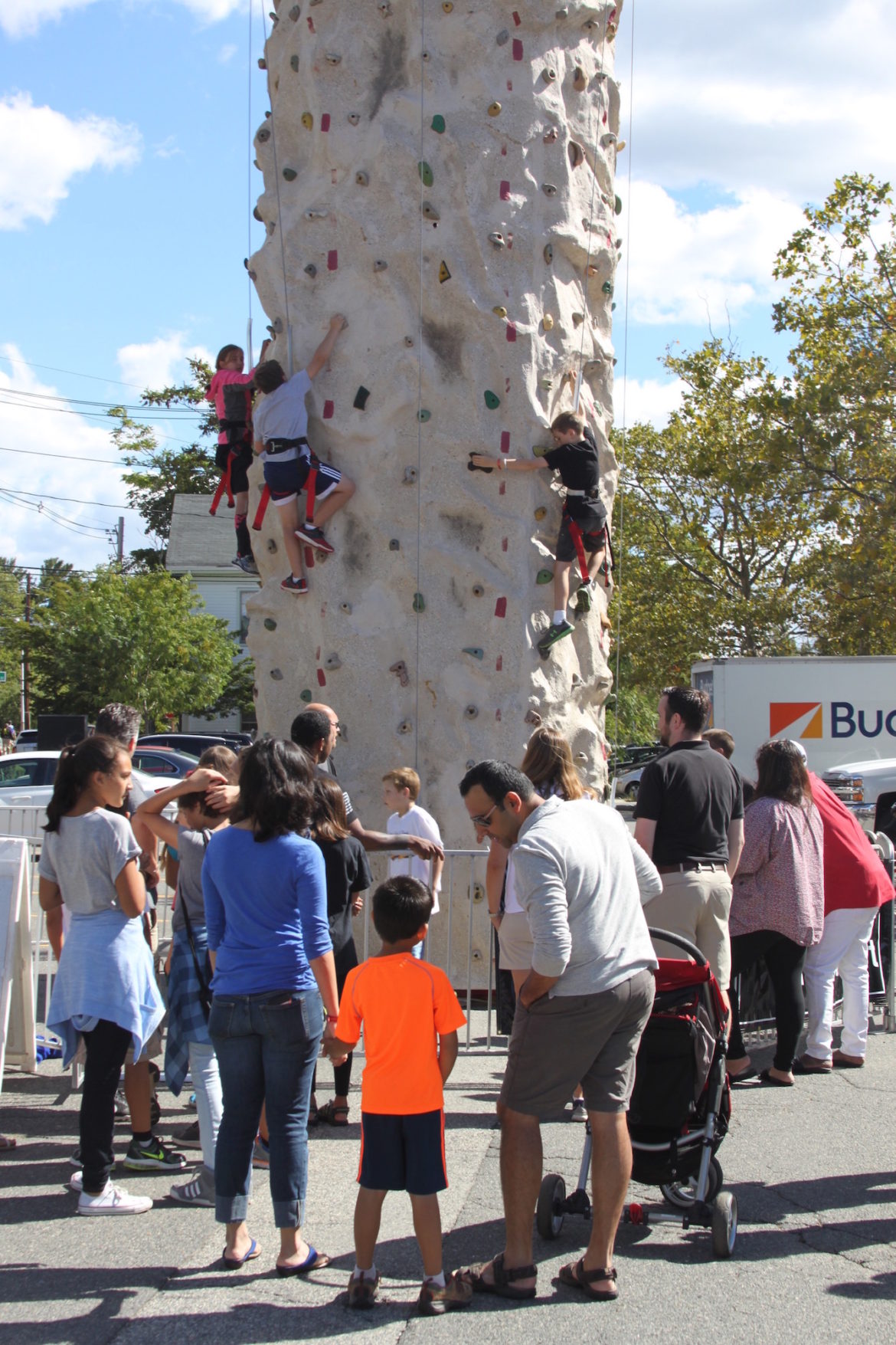 The climbing wall was a new addition to the Faire on the Square, and a popular one.
