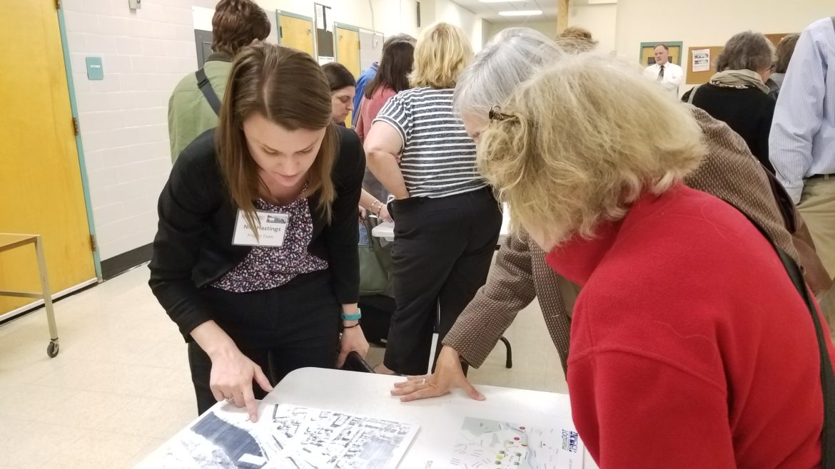 A consultant for the Mass. Department of Transportation goes over some of the options to improve Arsenal Street with residents Tuesday at Watertown Middle School.
