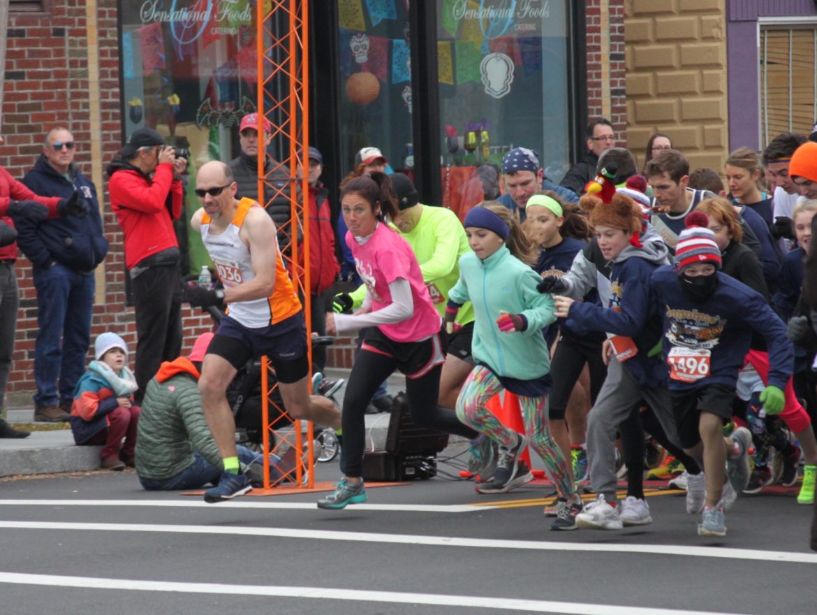 Ready, set, GO! Runners take off on the 5K Turkey Trot in Watertown.