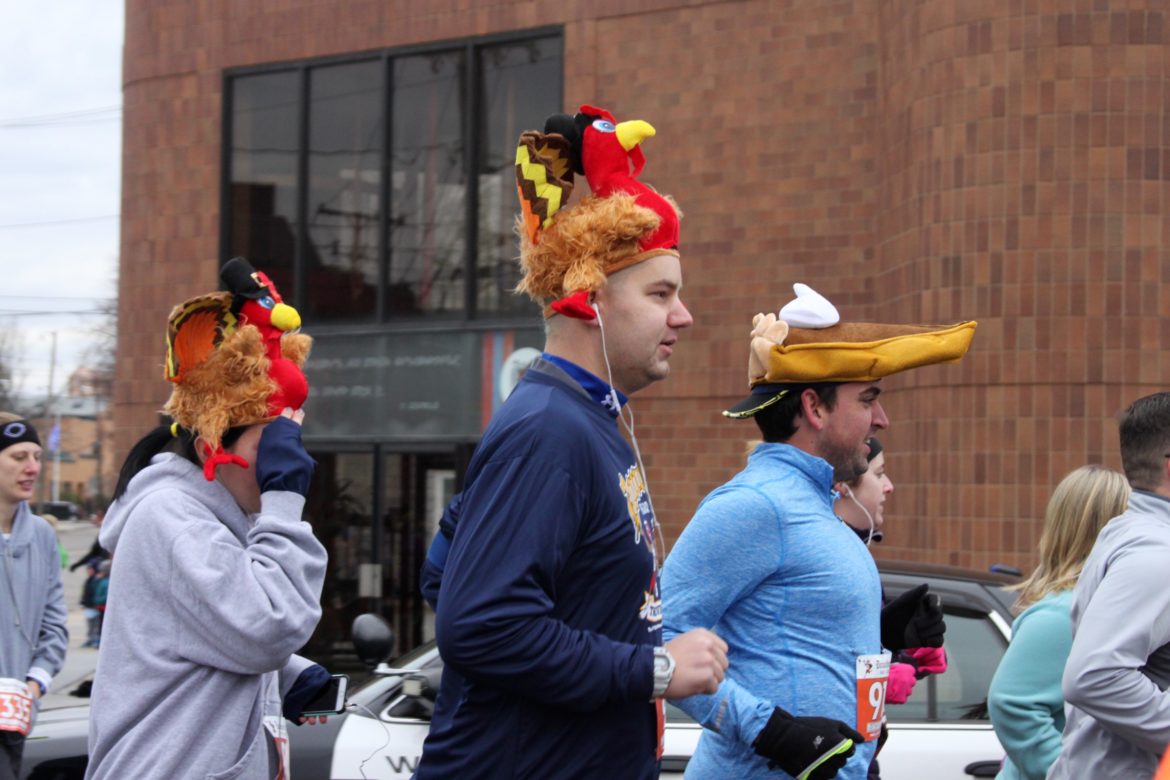 Festive runners don Thanksgiving themed headgear during the 11th annual Donohue's Bar & Grill Turkey Trot.