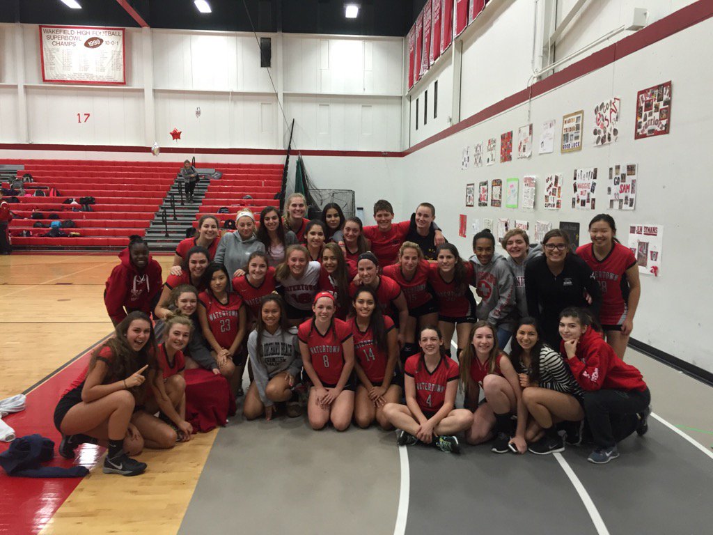 The Watertown High School volleyball team celebrates after making the State Tournament for the first time.