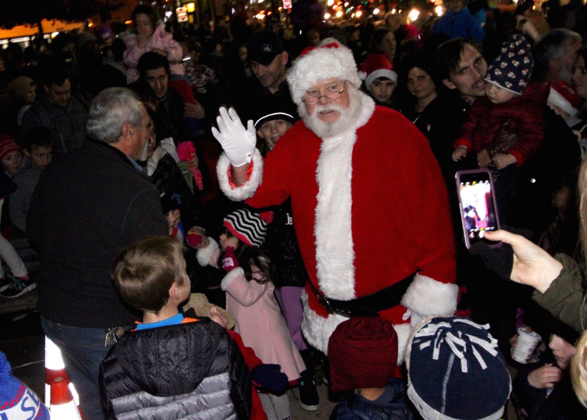 Santa Claus waved from the middle of his adoring fans at the Watertown Tree Lighting Celebration.